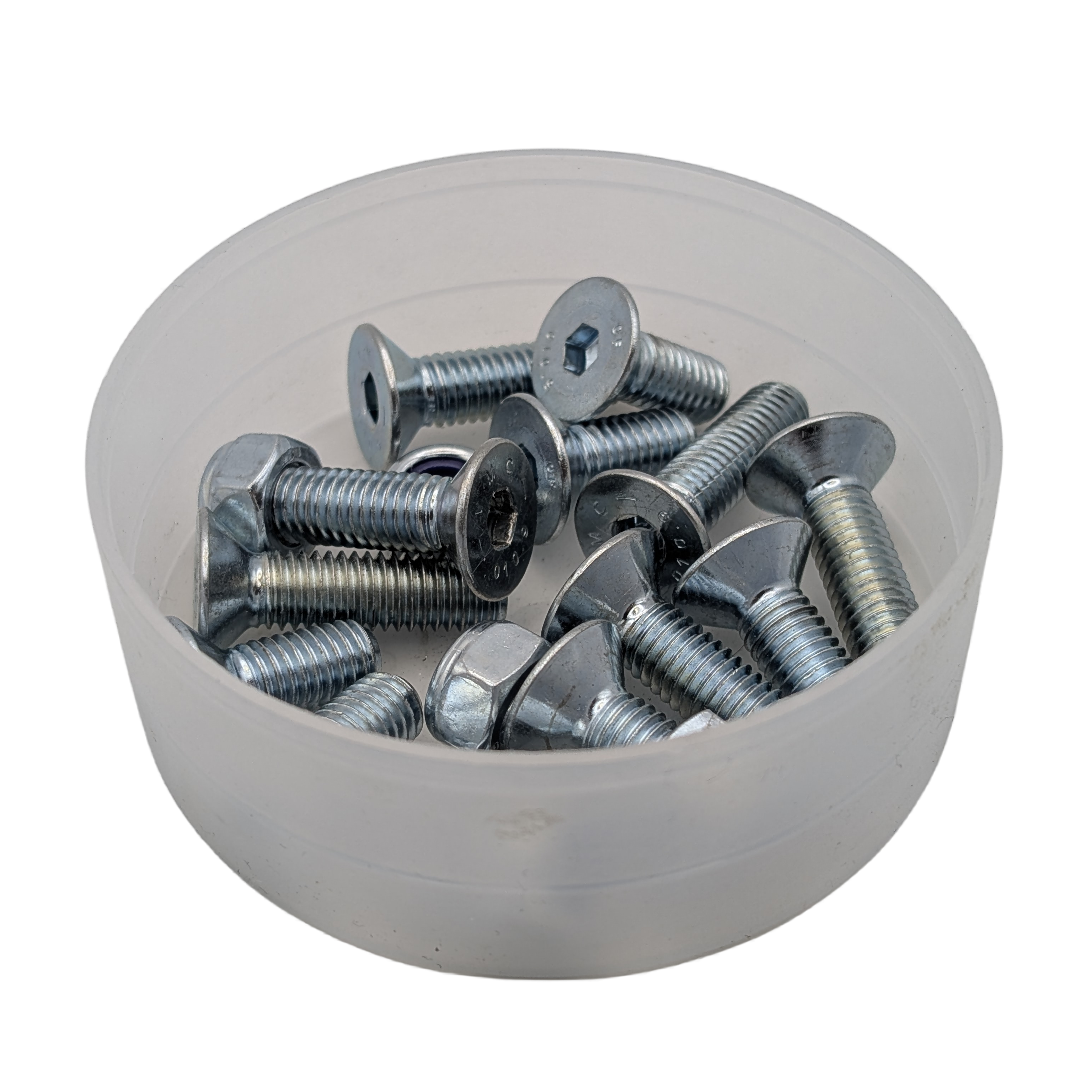 Bowl filled with metal screws on a white background